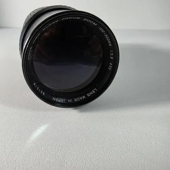 HOYA HMC 100-300MM F 5.6 ZOOM LENS FOR CANON