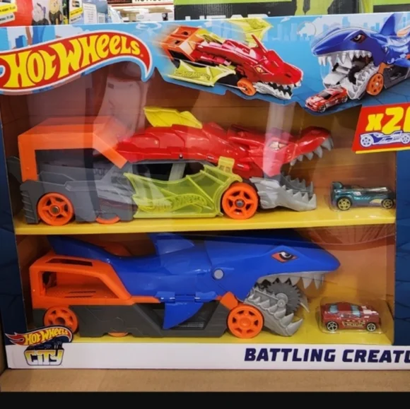 Hot Wheels City Battling Creature Transports with 20 Die-Cast Cars