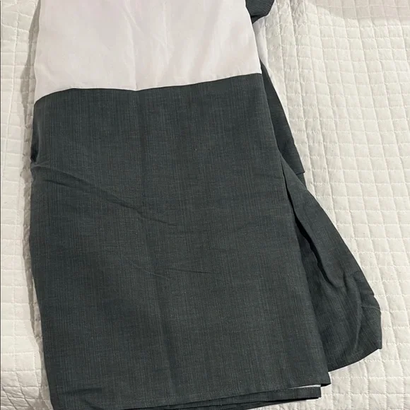 King Size dust ruffle, 18.5” drop, dark green, like new