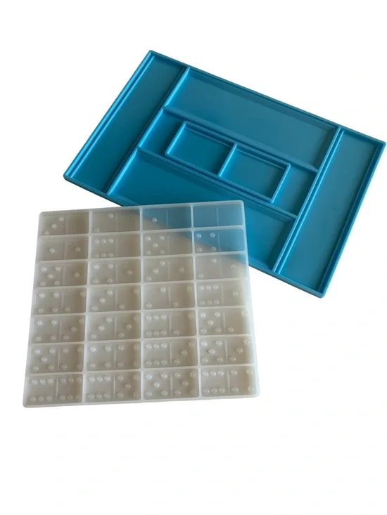 Resin molds for dominoes and domino carrying case