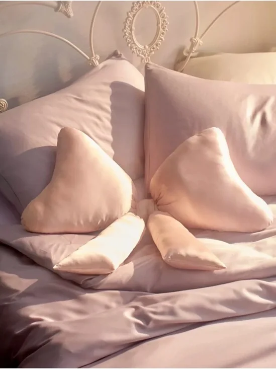 Urban outfitters Big Bow Satin Throw Pillow in ballet slipper