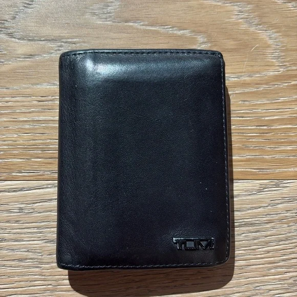 Tumi black men’s wallet with photo ID pocket