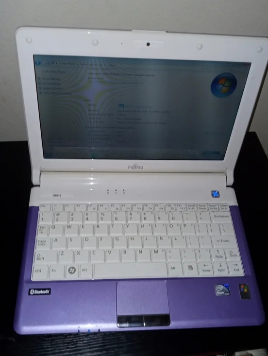 Fujitsu M2010 Series Purple Windows 7 Starter Netbook Laptop Computer