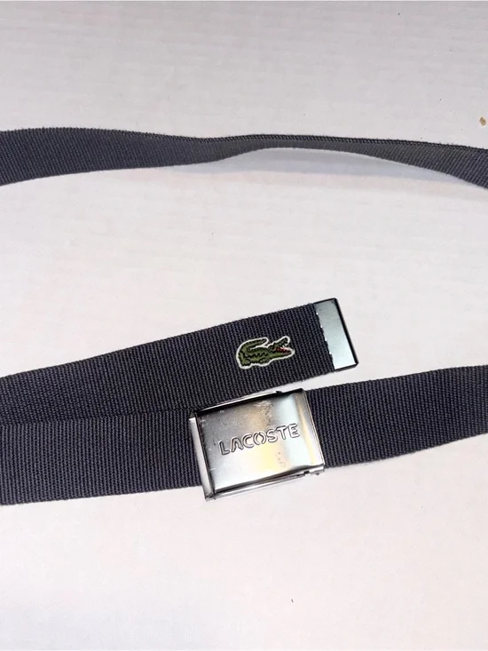 Lacoste men's woven belt featuring a metal plate buckle logo engraved patch 42”