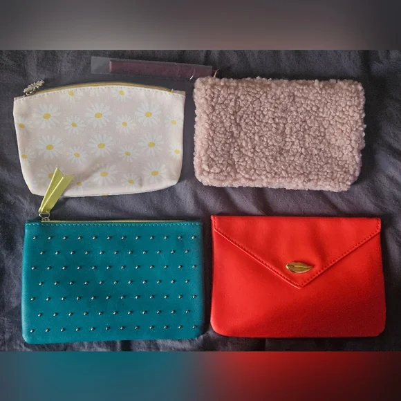 4 ipsy makeup/travel bags