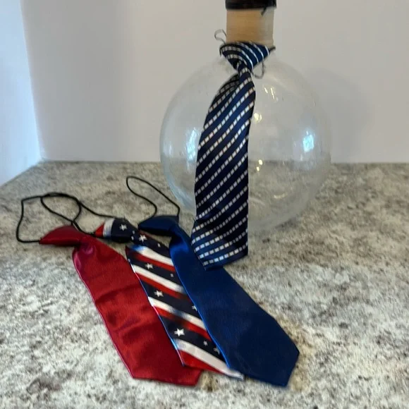 ties 10 inch satin look and feel NWOT set of four! attached the elastic cord