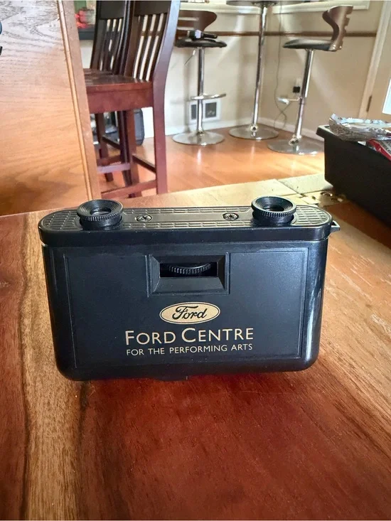 Ford black promotional viewer with gold logo