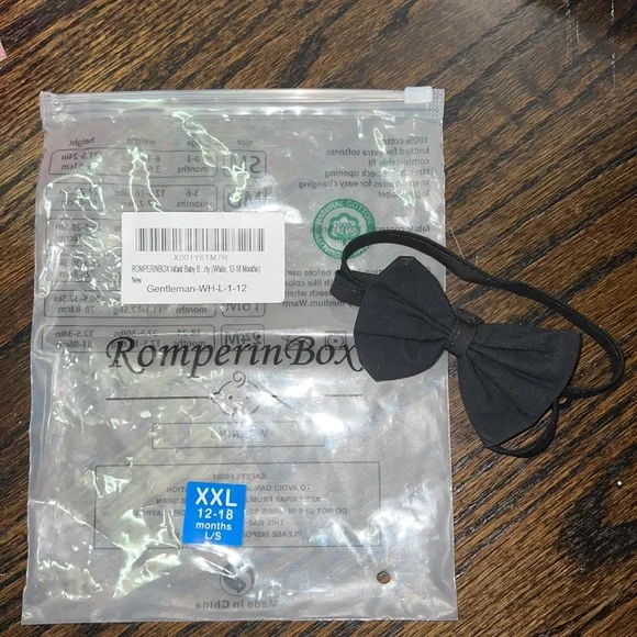 NWOT Baby bow tie black worn once. 12-18 months