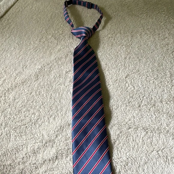 Kids adjustable neck tie. Blue and red striped.