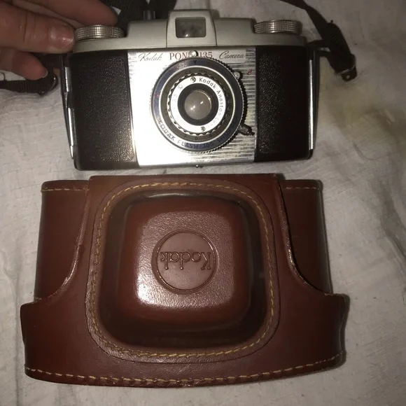 Vintage Kodak camera with antique tri pod