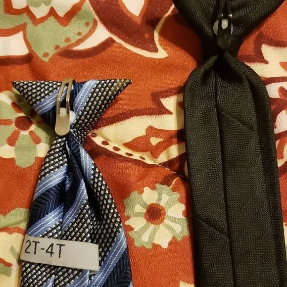 3 boys clip on ties and 1 that slips over the head