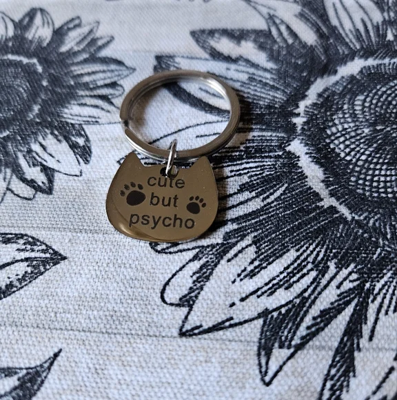Cute but psycho cat shaped collar tag