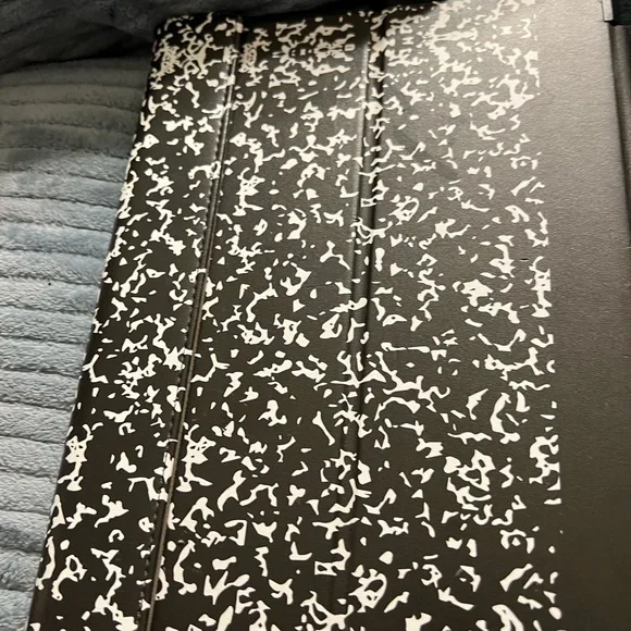 Ten inch composition note book tablet cover.