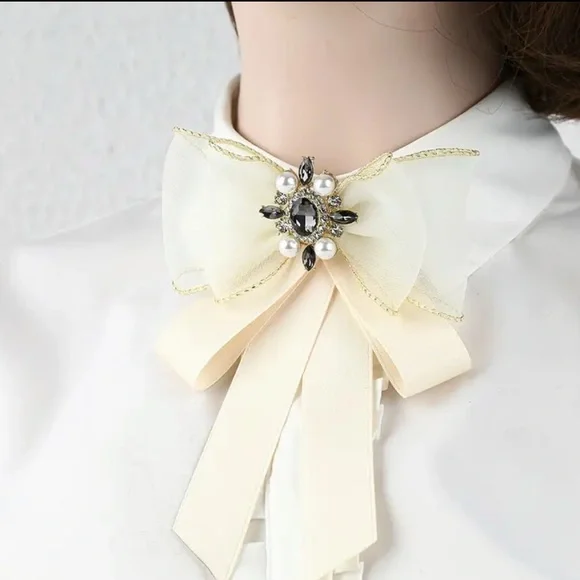 Chic Cream Bow Brooch with Pearl and Gem Accents