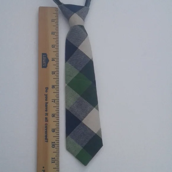 Little boy zipper tie brand is city of London