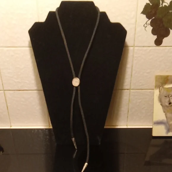 Kids mother of pearl Tie. About 16 inches.