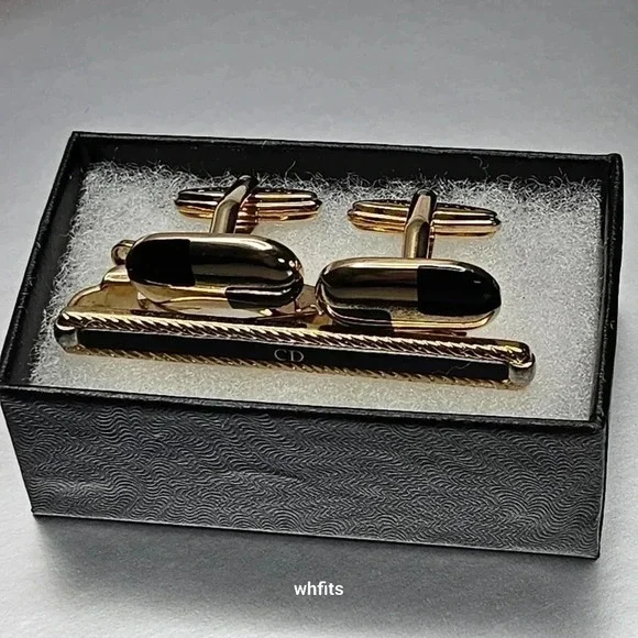 Christian Dior black and gold tone cufflinks and tie bar set