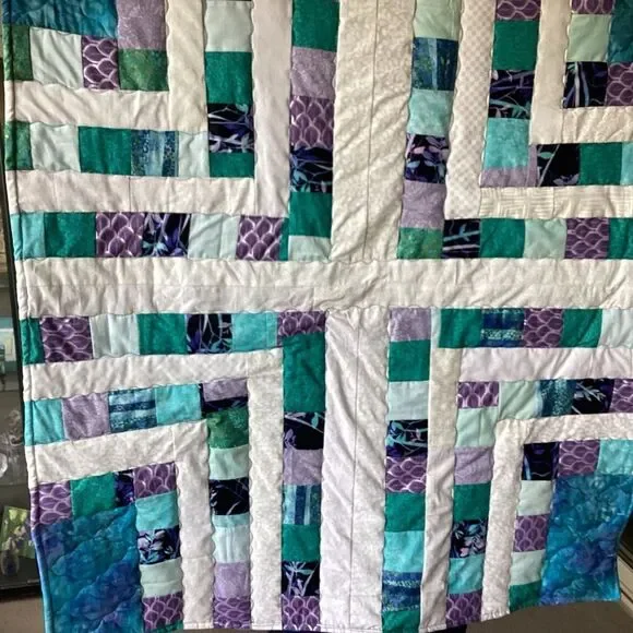 NWT. Hand Crafted Quilt of Blues, Purples and Turquoises