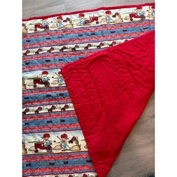 Handmade baby or toddler quilt “what happens on my tractor stays…