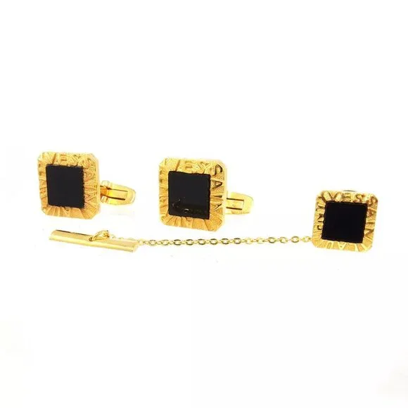 YVES SAINT LAURENT cuffs logo Gold hardware Authentic used T17502