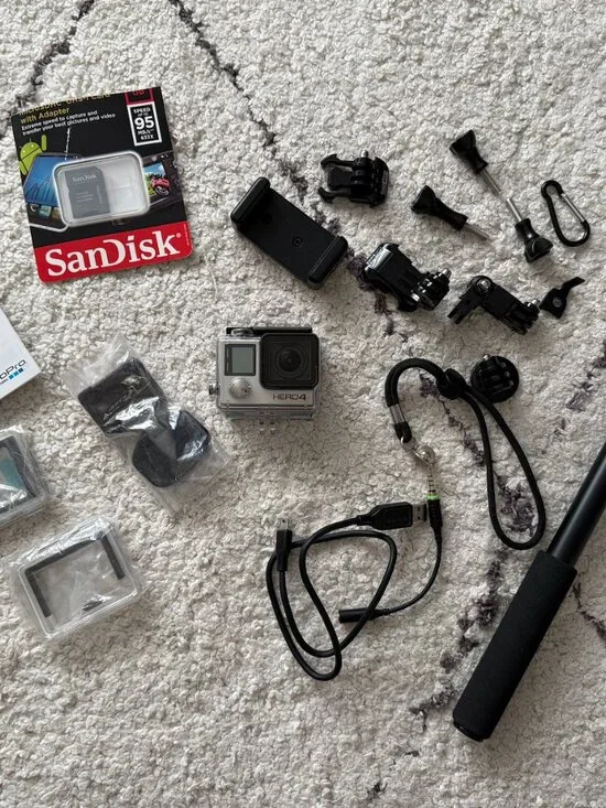Brand New Go Pro Hero 4 silver waterproof - with selfie stick, 32GB card