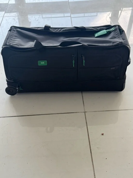 TUMI Tall Black Rolling Duffel Check on Alpha Suitcase Luggage Bag Green Accents