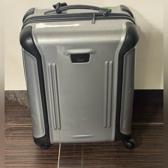 Tumi Vapor Silver and Black Hardside Spinner Carry-On
