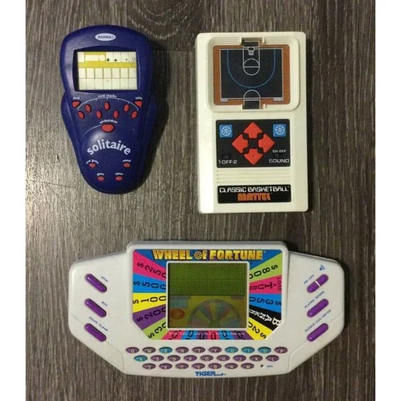 3 Handheld Games Mattel Basketball 2003 and Tiger Wheel Of Fortune 1995 Solitare