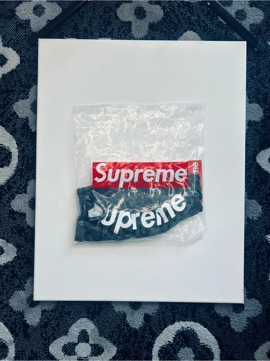 Supreme Black Face Mask with White Logo and Red Tag