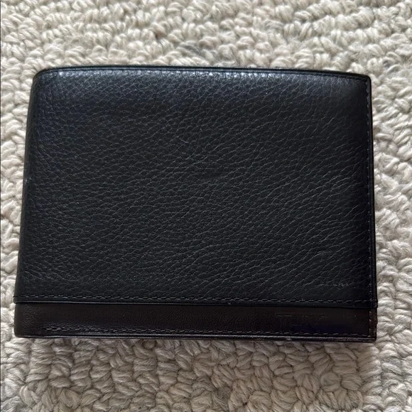 Tumi Black Leather Double Billfold Wallet with Coin Holder.