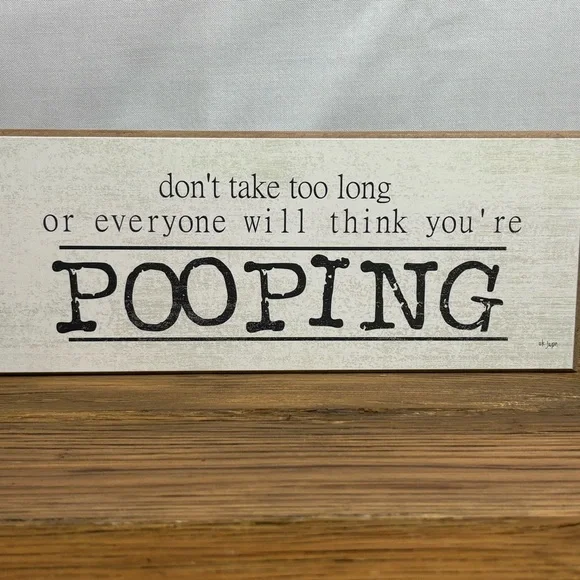 Humorous‎ Bathroom Sign