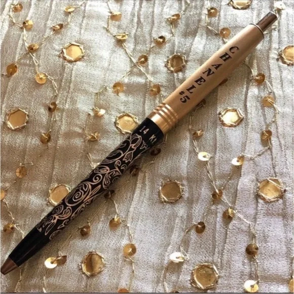14K gold filigree pen.