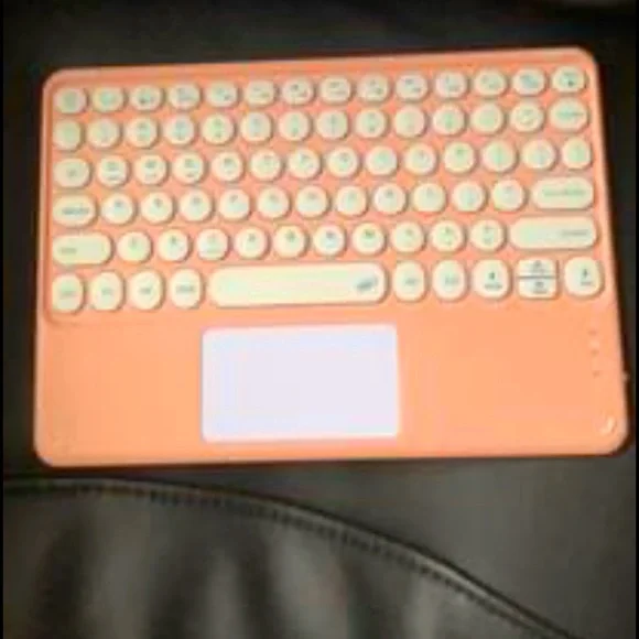 Pink blue tooth keyboard and mouse