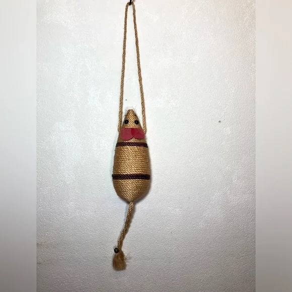 Decor toy mouse for a cat made of jute rope isolated.