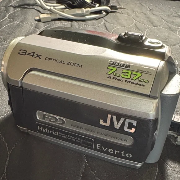 JVC Everio Hybrid Camcorder with 34x Optical Zoom works great can use for parts