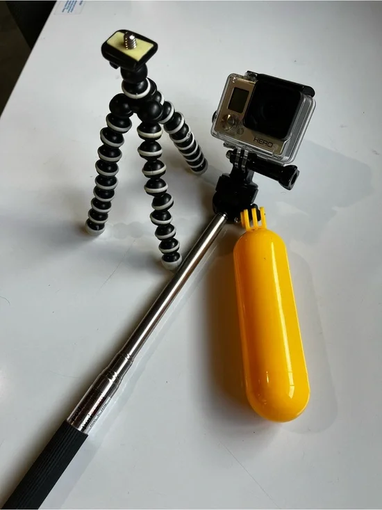 GoPro HERO 3 with Yellow Floating Hand Grip and Black/White Flexible Tripod