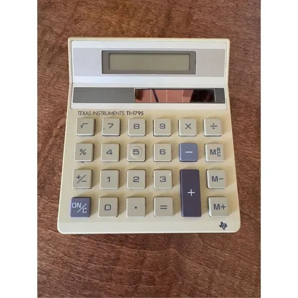 Texas Instruments Solar powered by sun like Superman vintage calculator c-1286a