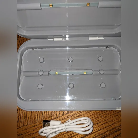 Globe phone disinfector