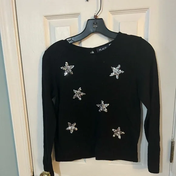 The children’s place black sweater with sequins stars.