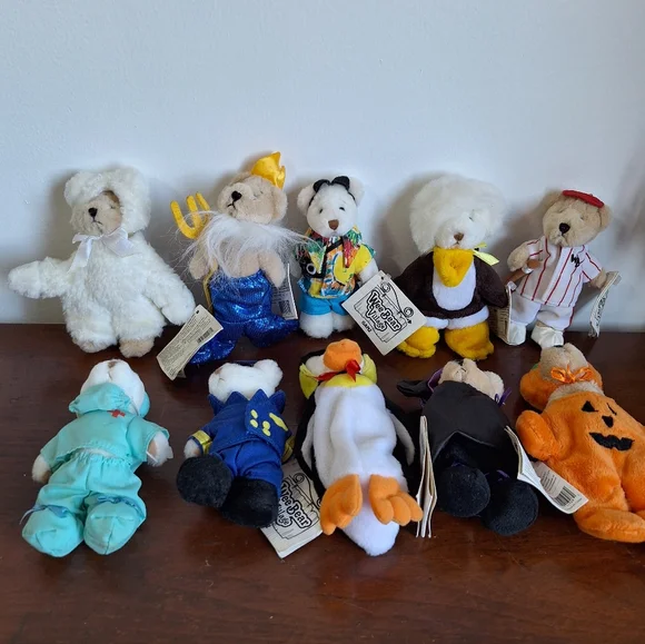 Collectible teddy bears from the Ganz brand, specifically from the Wee Bear Vill