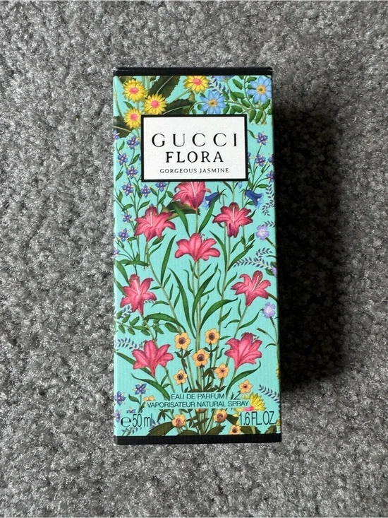Gucci, Kilian, and Kate Spade boxes