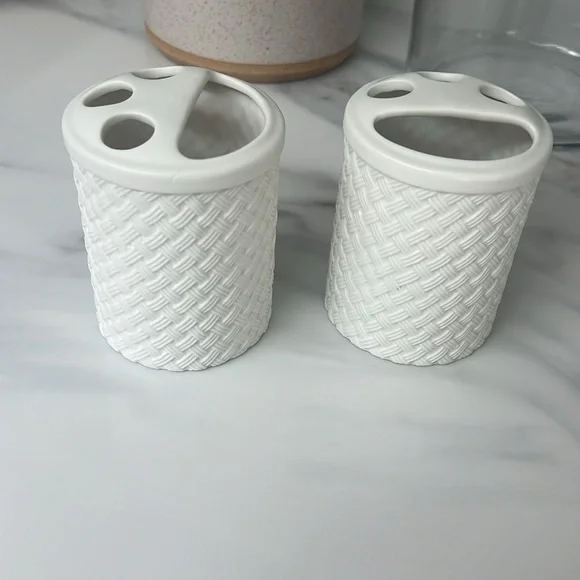 Pair of Pottery Barn ceramic toothbrush holders