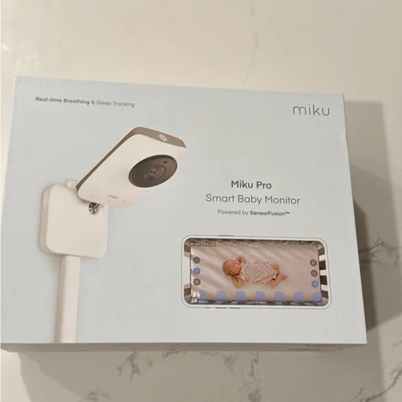 White Mini Pro Baby Monitor Camera with Modern Design. Used twice ever