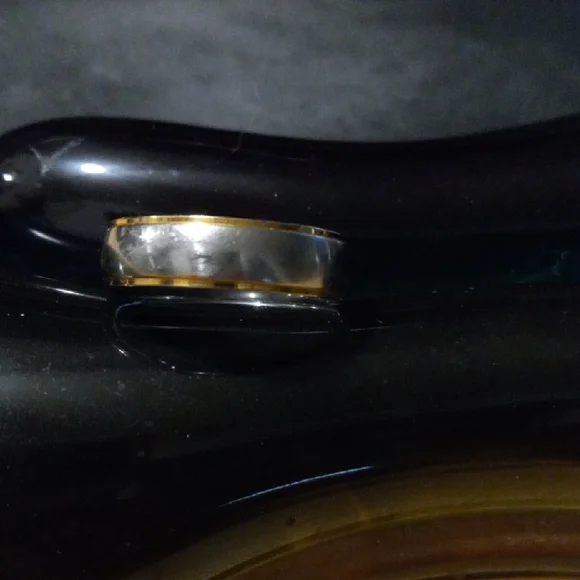 Silver and Gold Accessory, Ring Sz 11 It Is Stainless Steal.