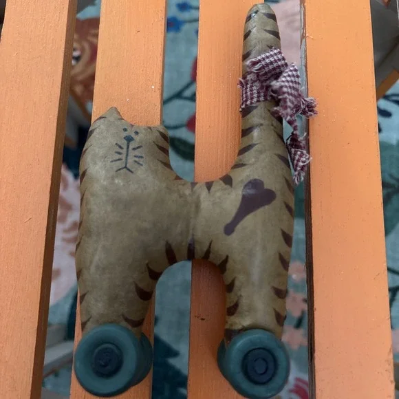 Folk Art Brown Cat Toy on Blue Wheels with Bow On Tail