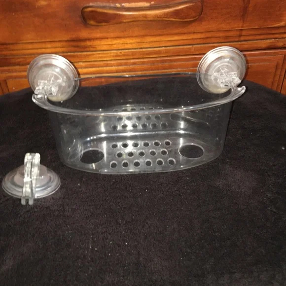 Clear suctioning bathroom caddy and hook