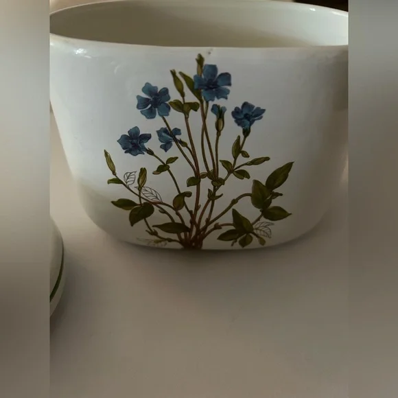 Beautiful flower decorated bathroom ceramic or possibly porcelain container.