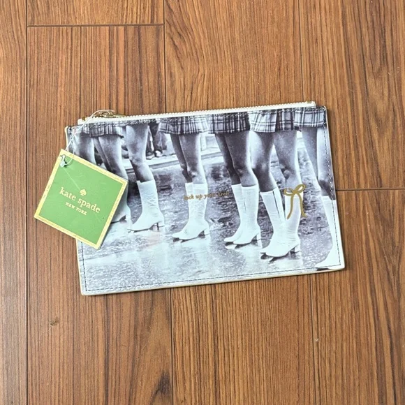 Kate Spade Kick Up Your Heels Black and White Pouch with Gold Accents