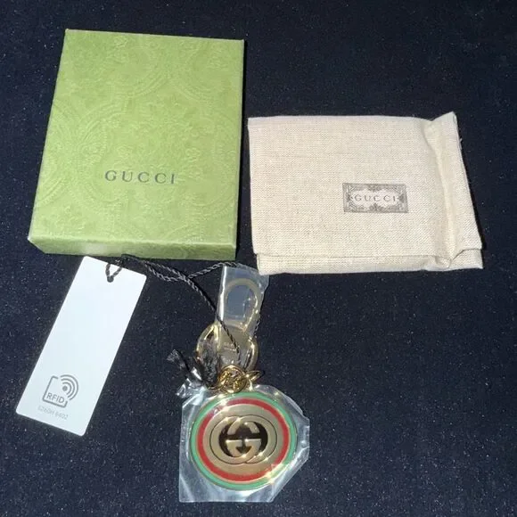 Brand new with box and dustbag Gucci Gold and Green Keychain