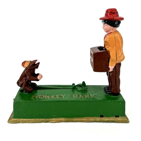 ORGAN GRINDER MONKEY BANK Cast Iron Works Great‎